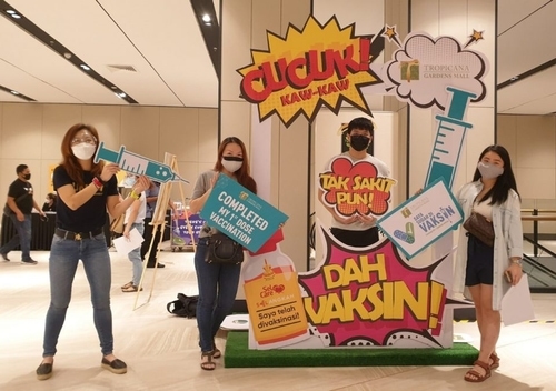 Touch n’ Go employees volunteer at Selangor’s vaccination centre